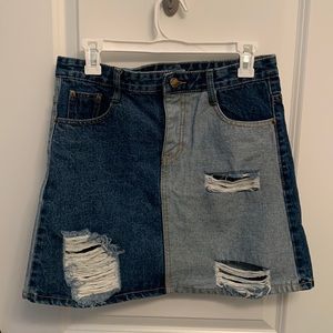 Asymmetrical wash denim mini skirt. Size 4-6. Never worn!